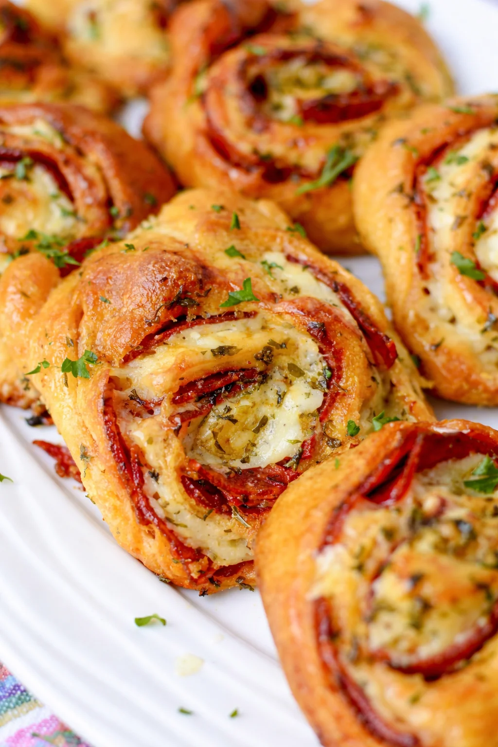 Delicious homemade pizza pinwheels ready to serve as a tasty snack or appetizer