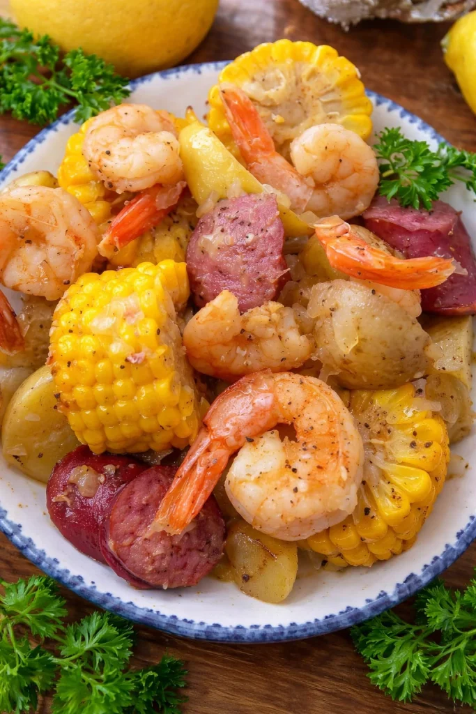 Shrimp and sausage foil packets ready for cooking on a grill.