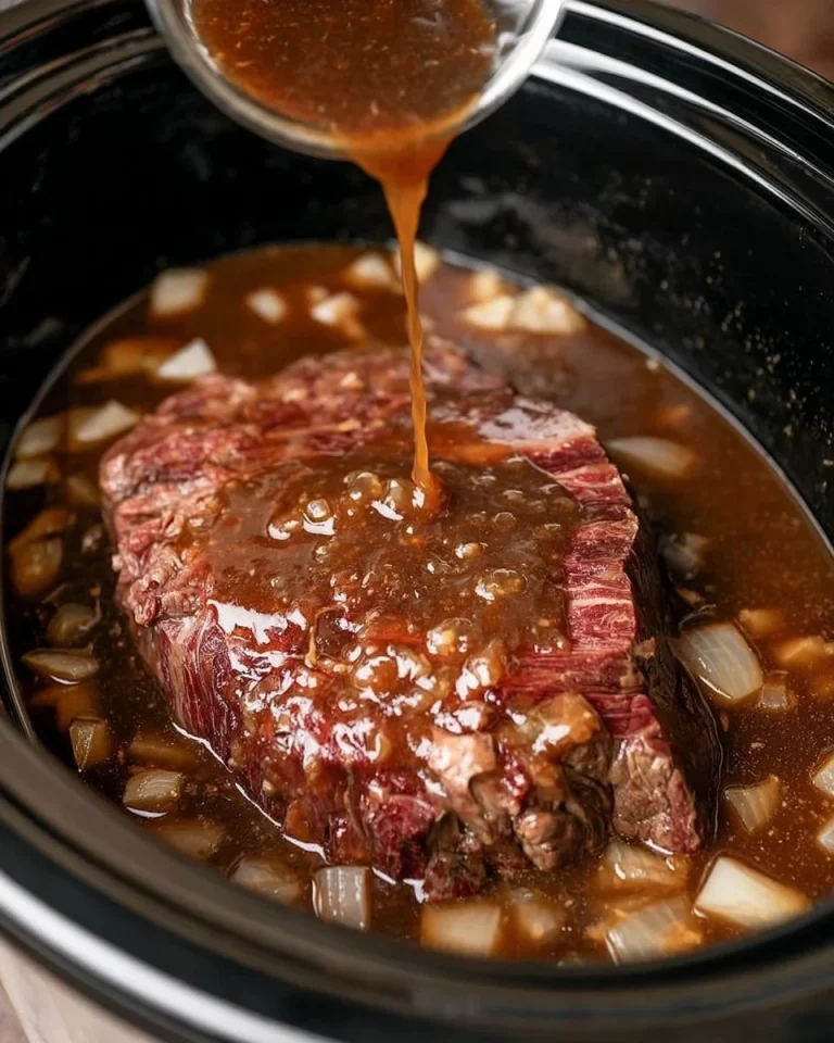 Slow Cooker Beef Roast with Brown Gravy Slow Cooker Beef Roast with Brown Gravy served on a plate