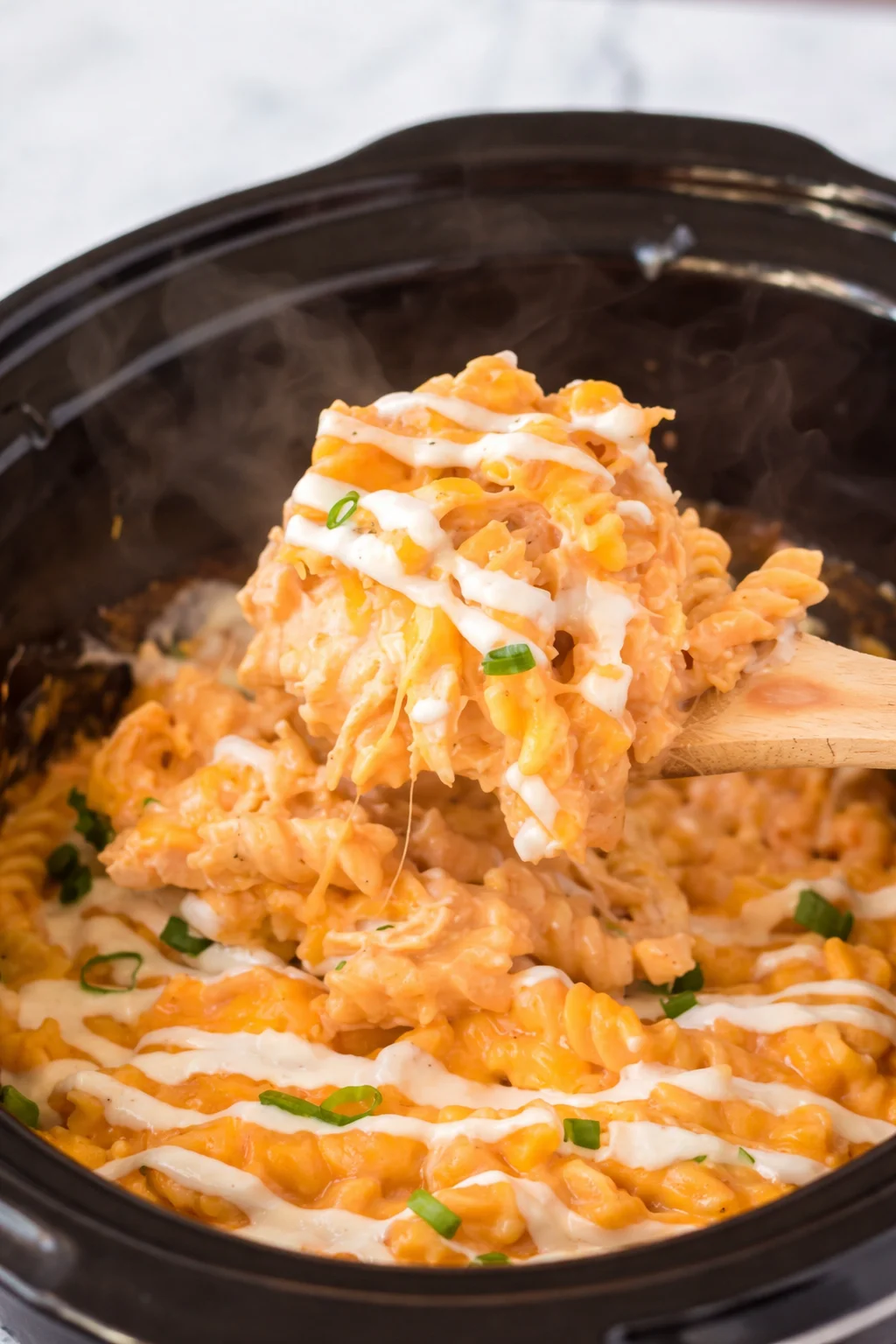 Slow Cooker Buffalo Chicken Mac and Cheese in a serving bowl