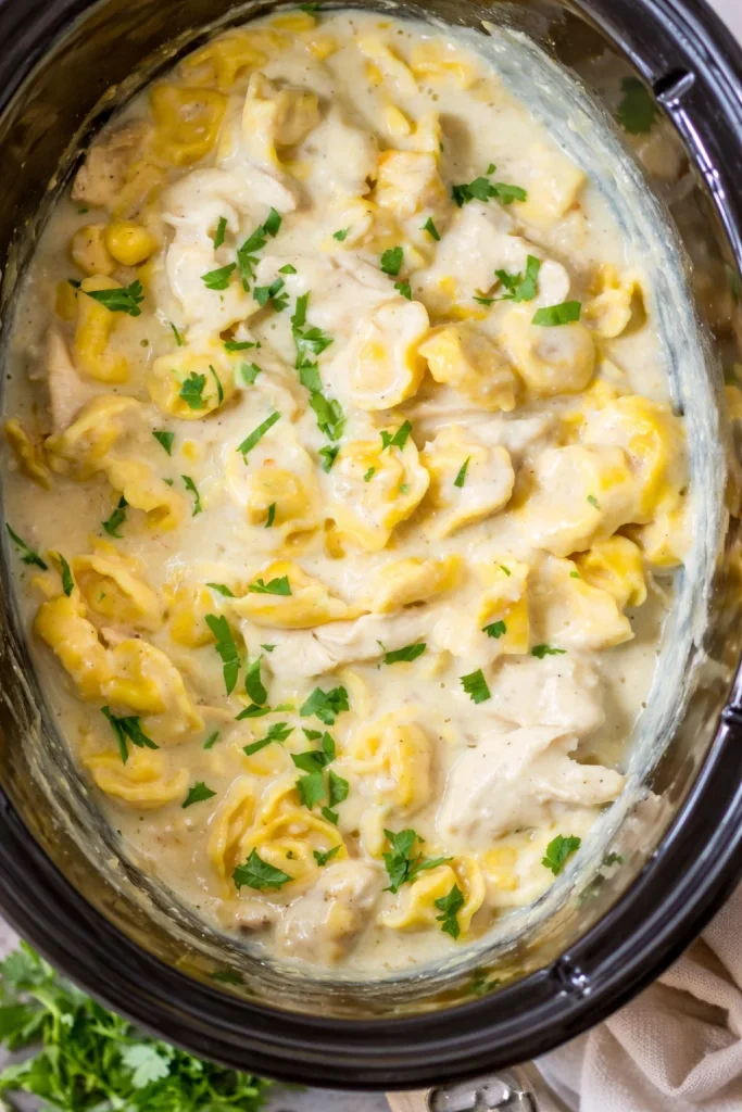Delicious Slow Cooker Chicken Tortellini prepared in a cozy kitchen