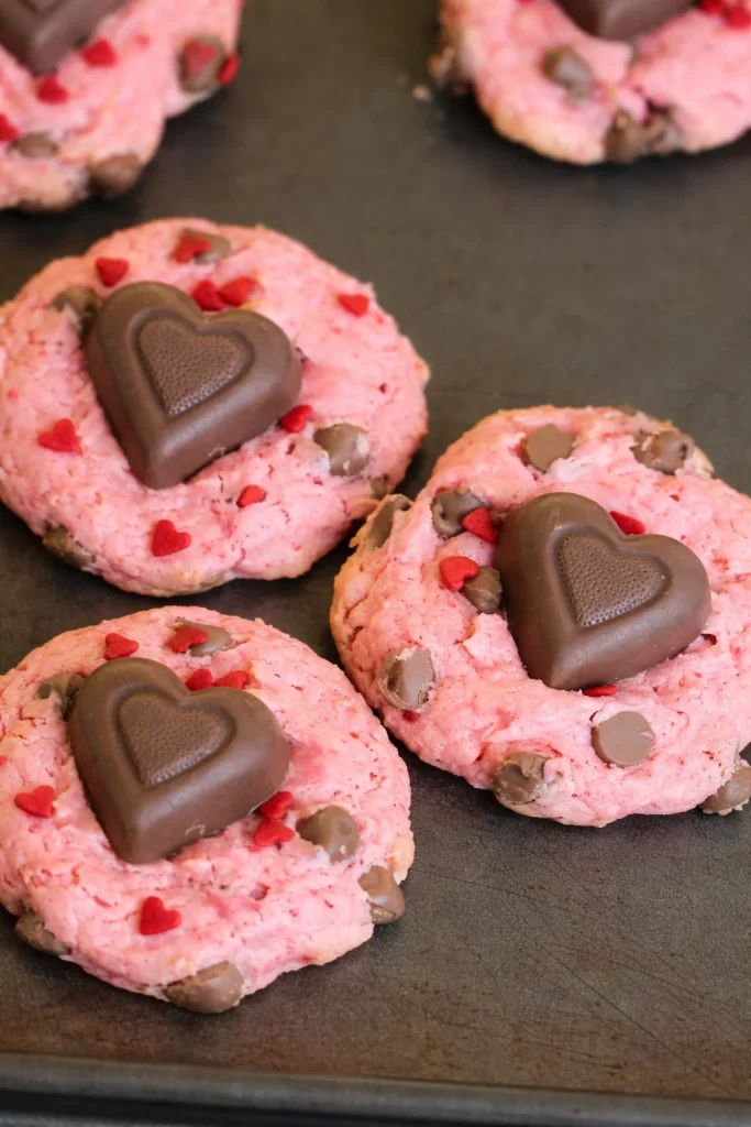 Freshly baked Strawberry Chocolate Chip Sweetheart Cookies on a plate