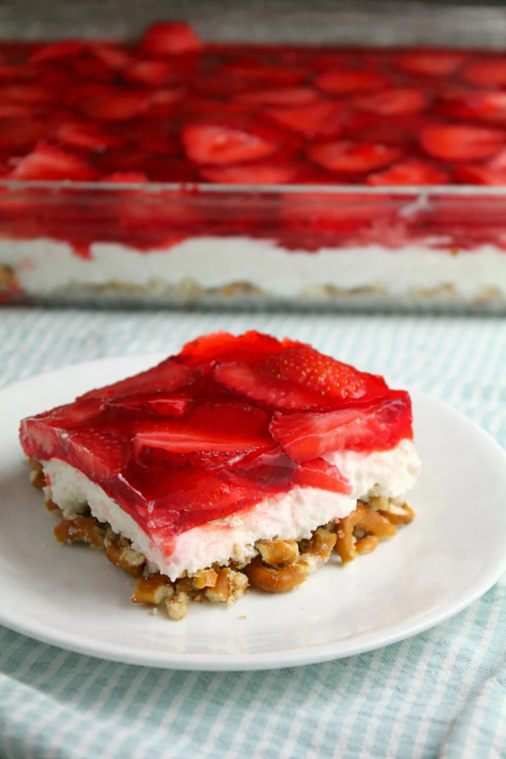 Delicious Strawberry Pretzel Salad with a crunchy crust and creamy topping