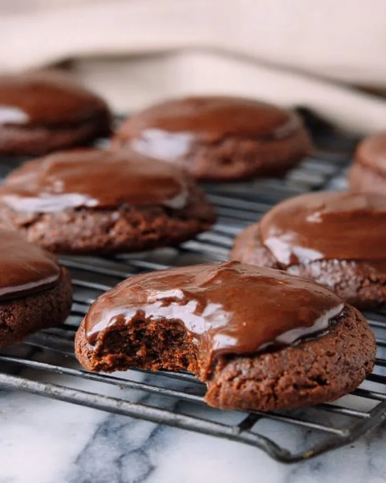 Texas Sheet Cake Cookies Delicious Texas Sheet Cake Cookies on a plate, topped with chocolate frosting
