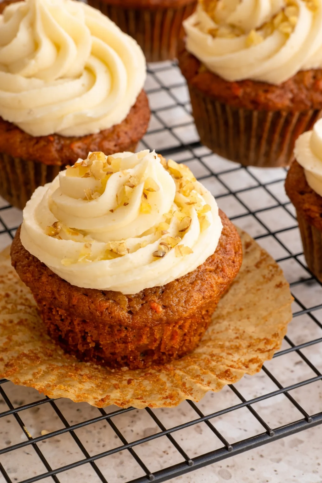 Moist Carrot Cake Cupcakes with crushed pineapple and cream cheese frosting