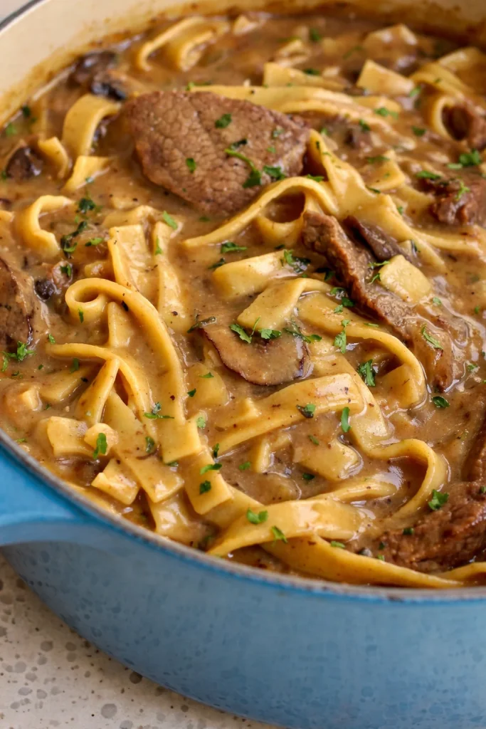 Creamy Beef Stroganoff with tender beef, onions, garlic, and mushrooms.