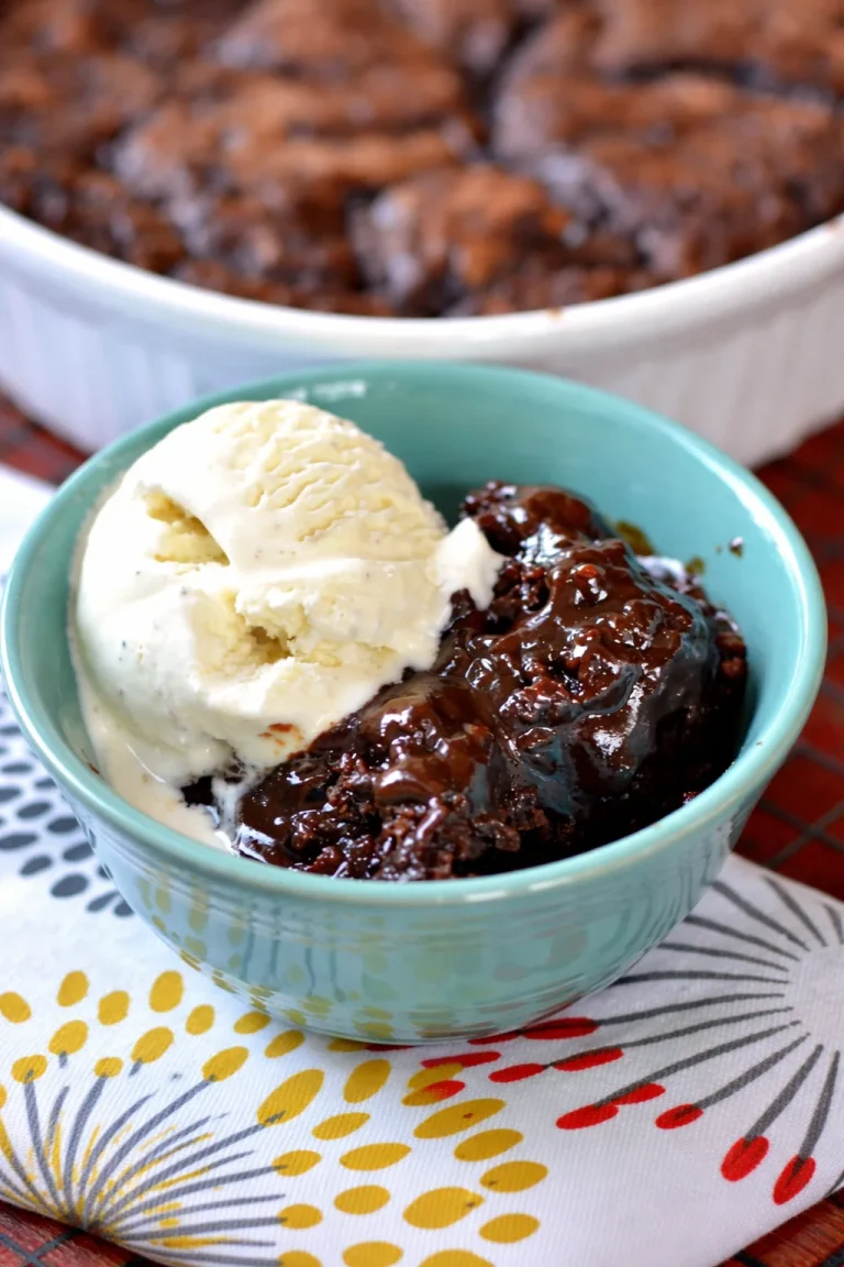 Decadent chocolate cobbler dessert topped with creamy chocolate pudding