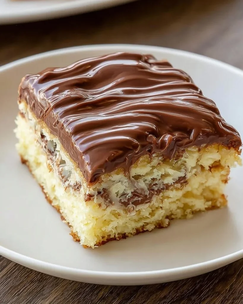 Delicious Banana Bread Cheesecake Bars topped with creamy cheesecake layer