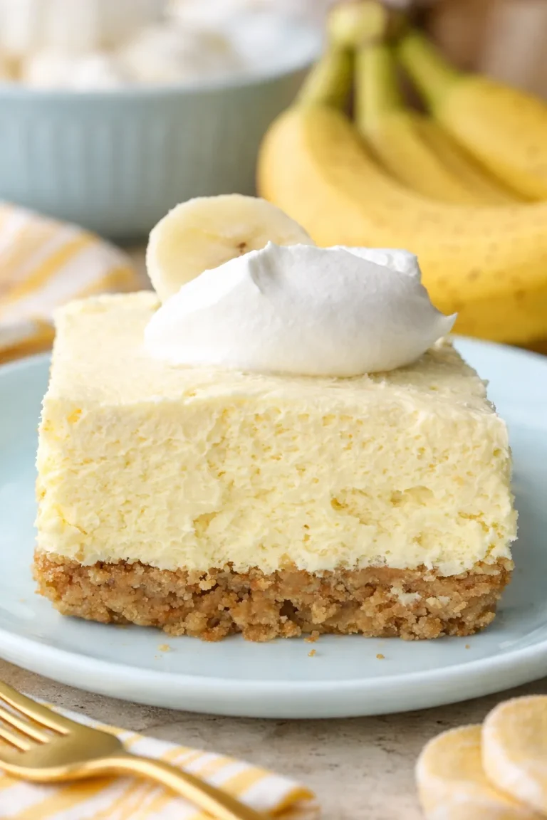 Banana Cream Cheesecake Bars Homemade Banana Cream Cheesecake Bars with whipped cream topping