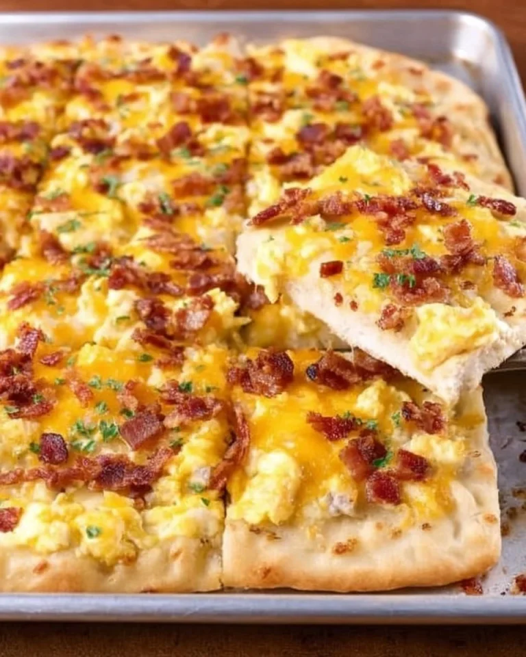 Best Breakfast Pizza Delicious breakfast pizza topped with eggs, cheese, and fresh ingredients