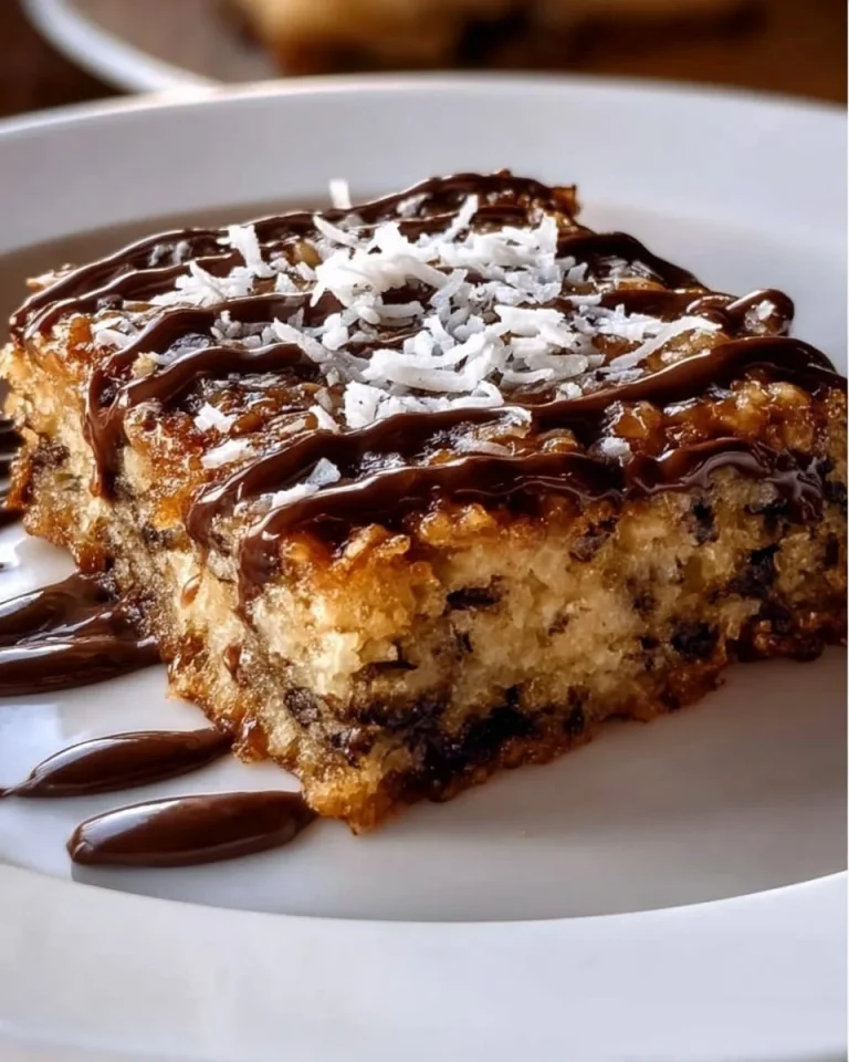 Delicious slice of German Chocolate Dump Cake with chocolate frosting and nuts