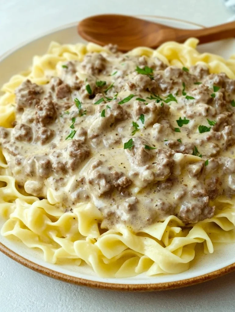 Delicious ground beef stroganoff served over egg noodles