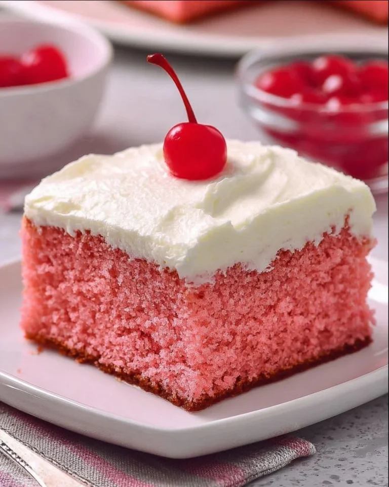 Very Cherry Cake topped with creamy vanilla buttercream frosting