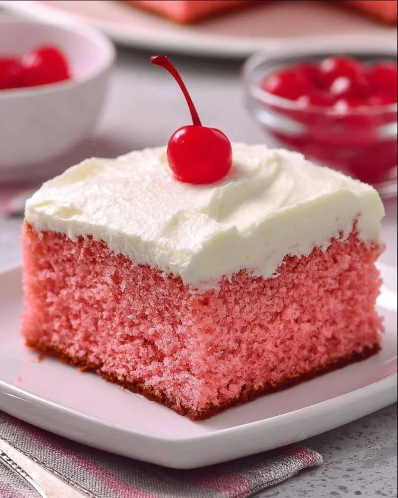 Very Cherry Cake topped with creamy vanilla buttercream frosting