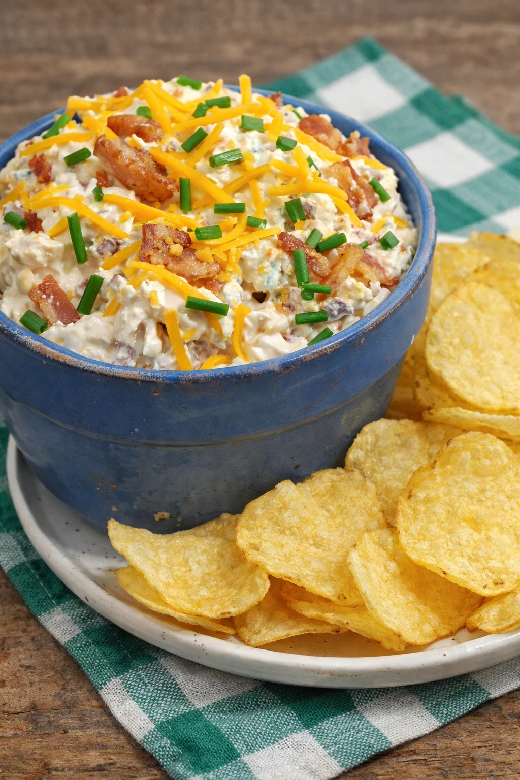 Delicious Million Dollar Bacon Dip served in a bowl with crispy bacon on top