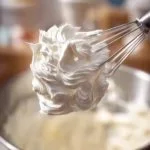 Delicious old-school ermine frosting topped on a cake slice.