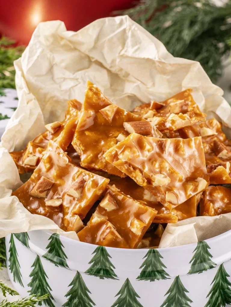 Homemade Peanut Brittle Delicious homemade peanut brittle with crunchy peanuts and a golden caramel texture.