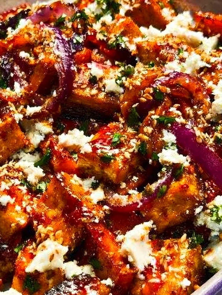 Delicious maple roasted pumpkin with chili and feta cheese garnish